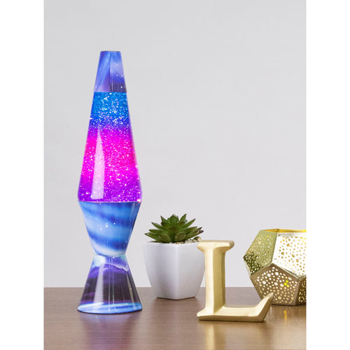 14.5" LAVA� Lamp Colormax Northern Lights - Glitter on a table with a succulent and a candle